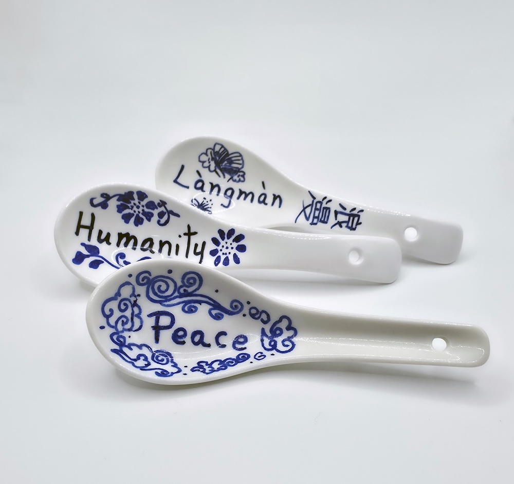 The Gathering (detail), hand-painted porcelain spoons. Courtesy of the artist.