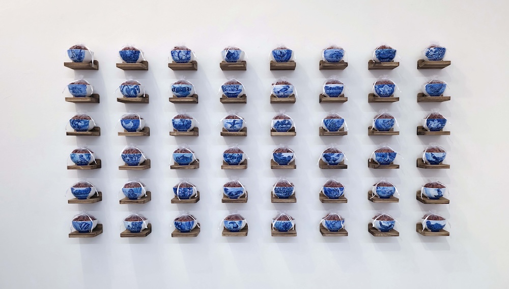 Las Poroteras, installation view. Chinese rice cups, beans, organza. Courtesy of the artist.