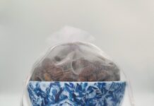 MaiYap: A House of Small Altars Las Poroteras (detail), painted rice cup and beans. Courtesy of the artist.